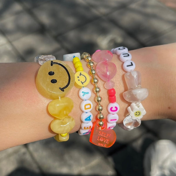 Crystal Bracelet - Thick-cut Amber Smiley Face